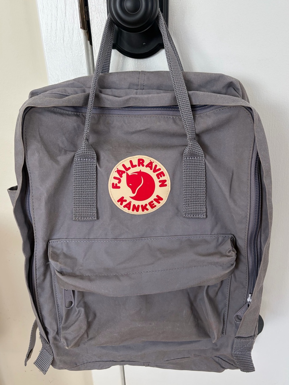 Fjallraven Kanken Backpack in Gray with Red Logo